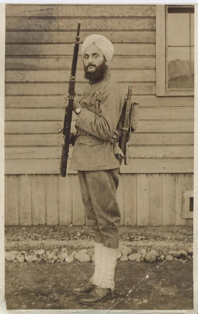 A portrait photograph of Bhagat Singh Thind in US Army uniform