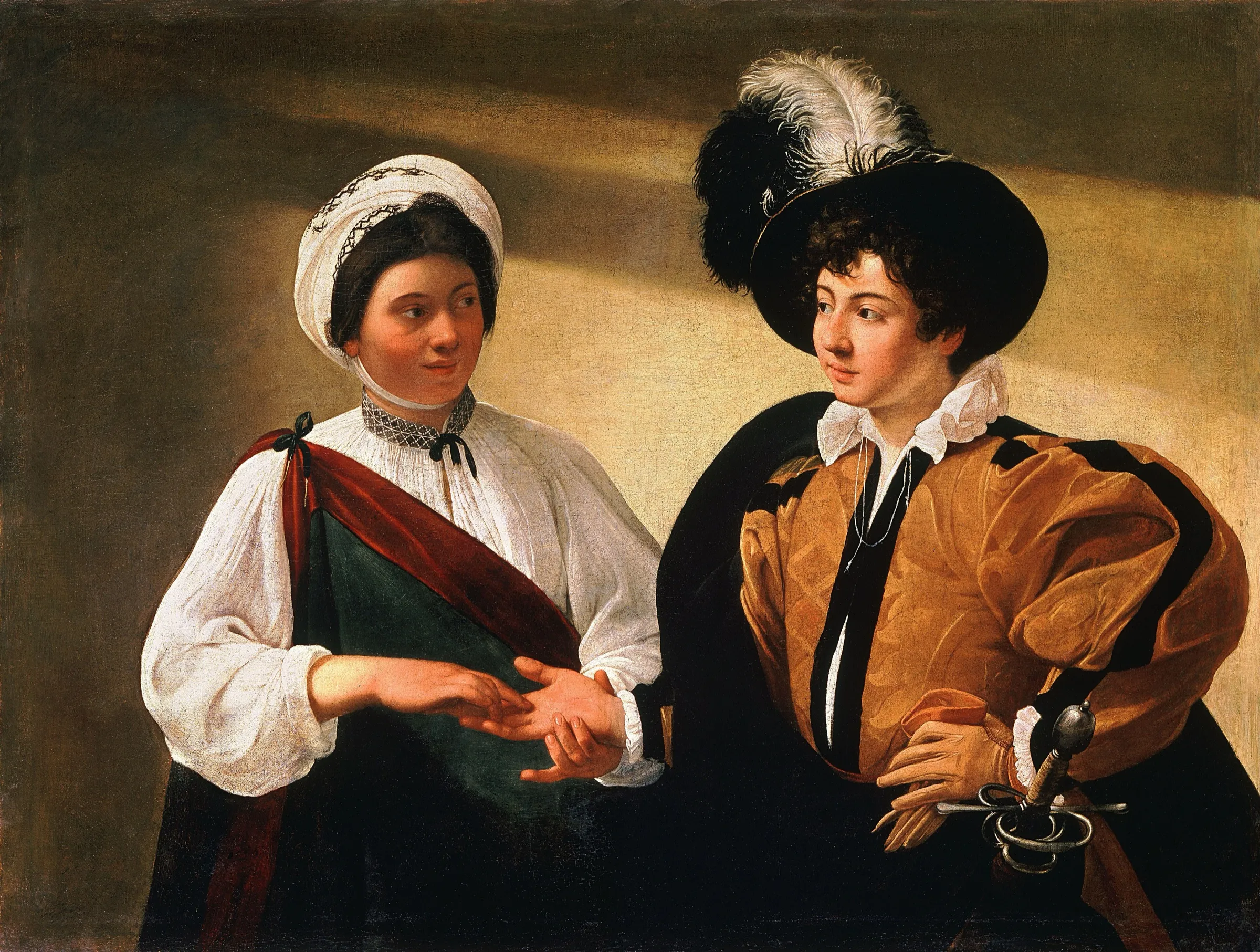 Caravaggio's painting of a young gypsy woman reading the palm of a well-dressed young man while gently slipping the ring from his finger