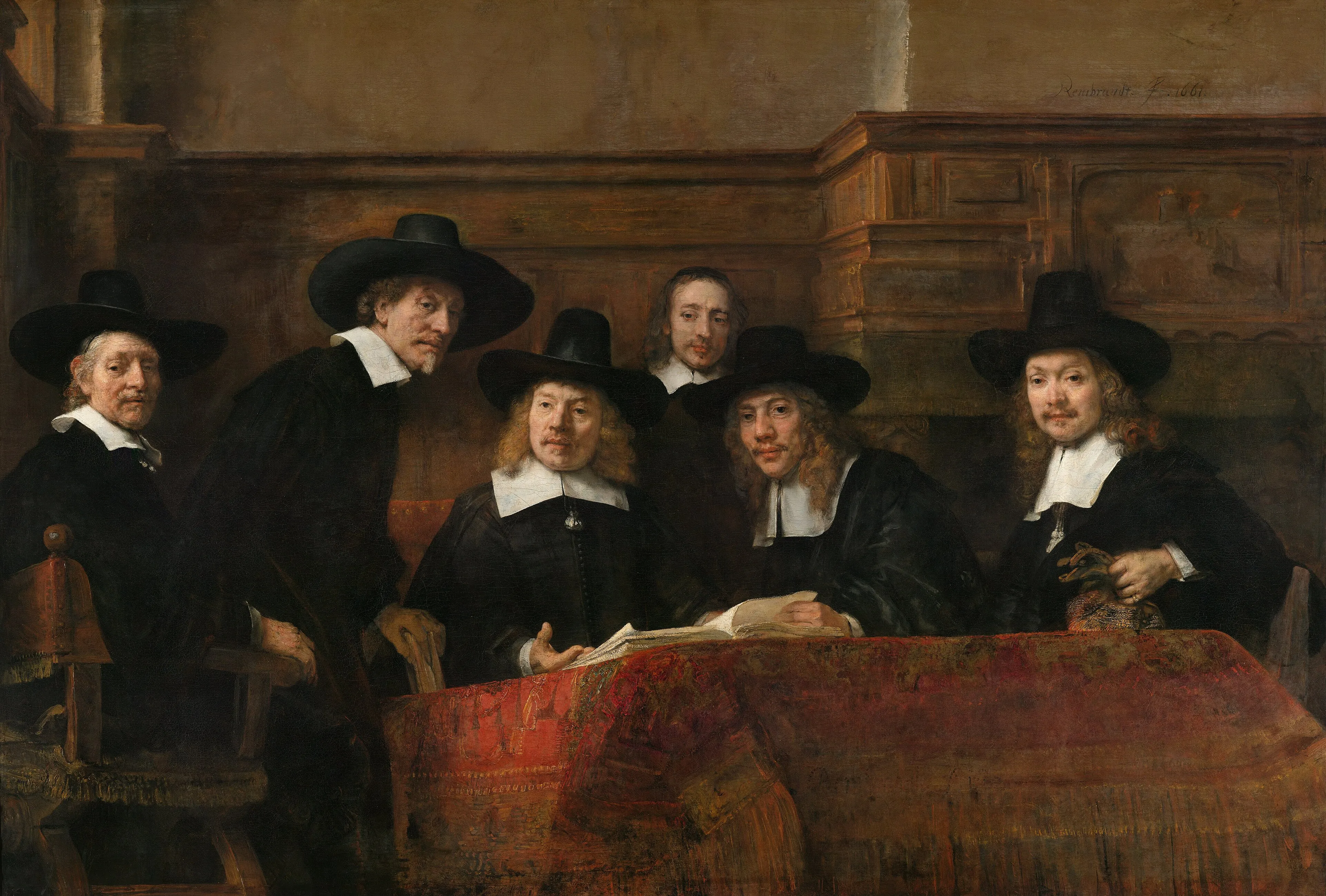 Rembrandt's group portrait of six men in black with broad white collars around a table covered with a red rug, several looking up at the viewer as if interrupted